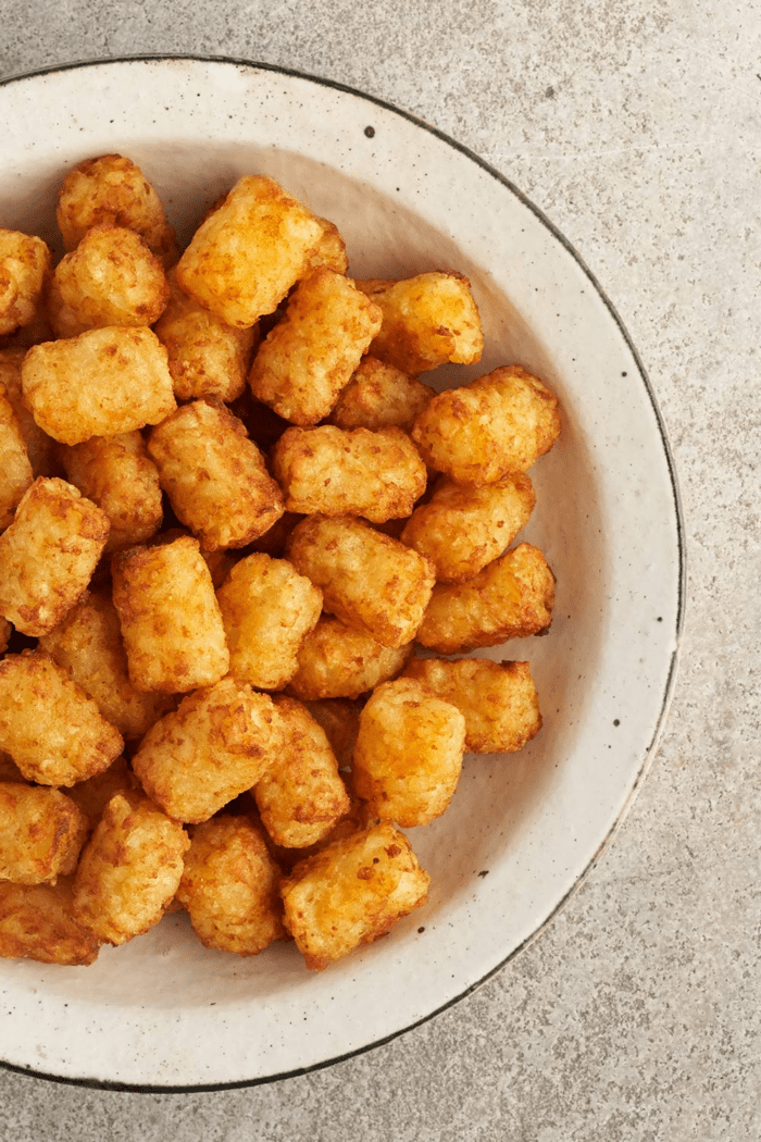 Crispy Seasoned Potato Puffs Roasted Garlic and Cracked Black Pepper, 19 Oz (Frozen) - Image 7