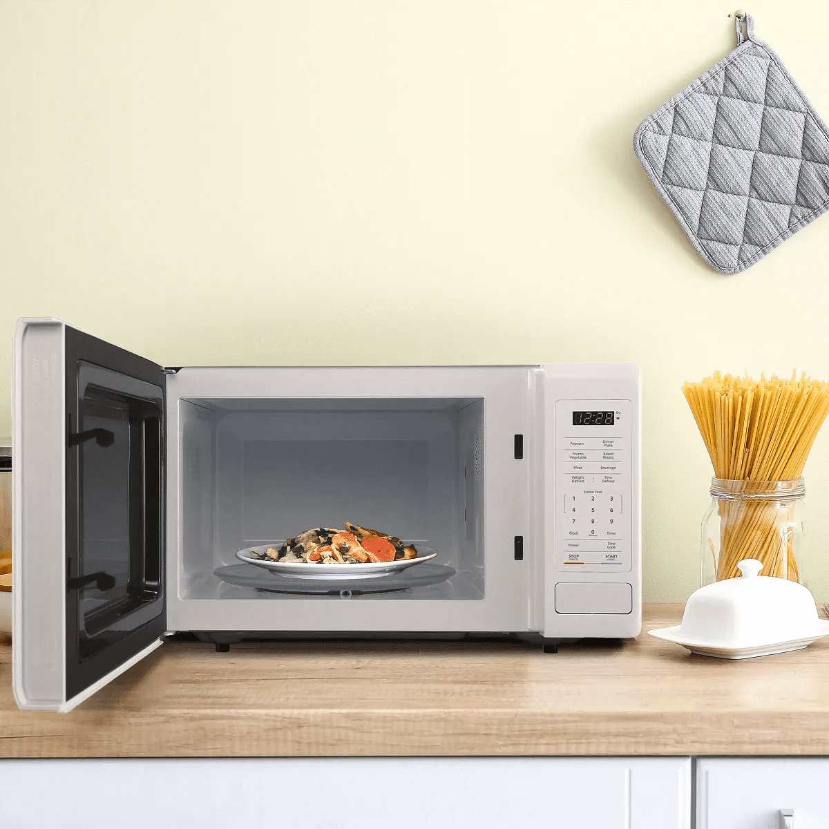 Magic Chef 0.9 Cubic Feet 900 Watt Small Stainless Countertop Microwave Oven for Compact Spaces W/ 6 Pre Programmed Cooking Modes, White - Image 6