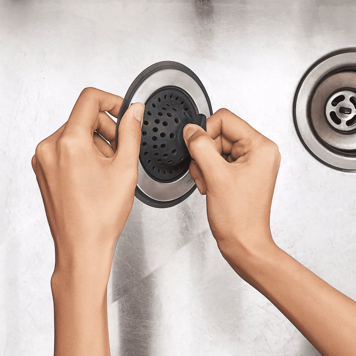 OXO Sink Stopper: Stainless Steel & Silicone Kitchen Drain Plug, 4.5" Diameter, Lifetime Warranty - Image 5