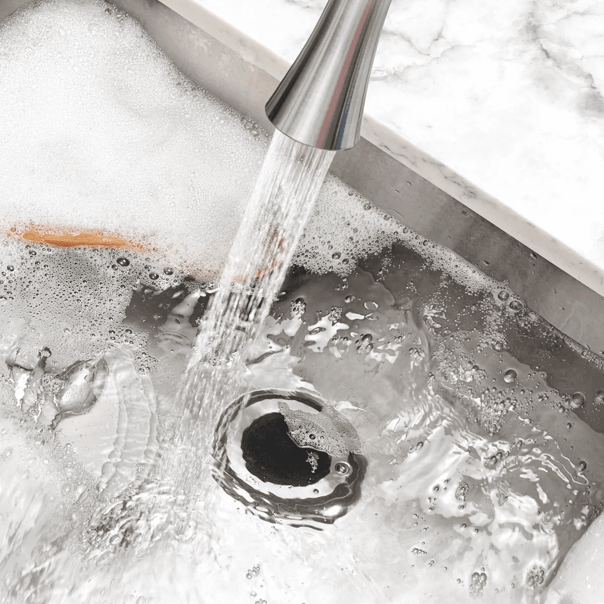 OXO Sink Stopper: Stainless Steel & Silicone Kitchen Drain Plug, 4.5" Diameter, Lifetime Warranty - Image 6